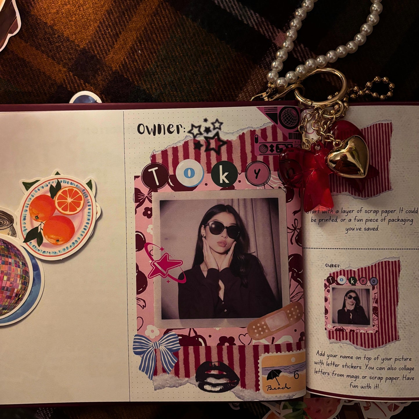 Personalized scrap journal owner page with photo, stickers, and layered paper design